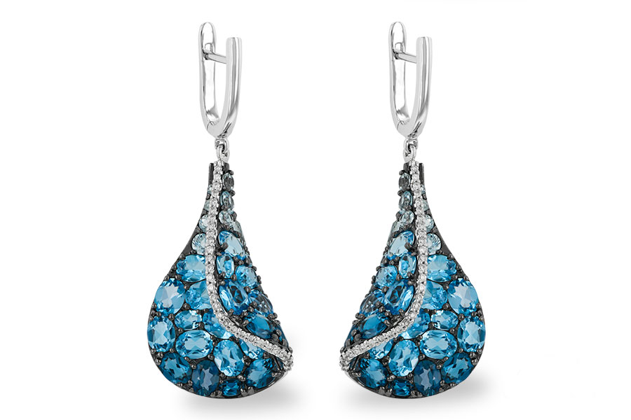 F223-68204: EARR 6.86 BLUE TOPAZ 7.05 TGW